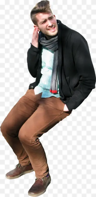 Casual Man Sitting Outdoors