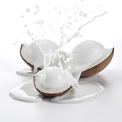 Coconut Milk Splashing from Halved Coconut